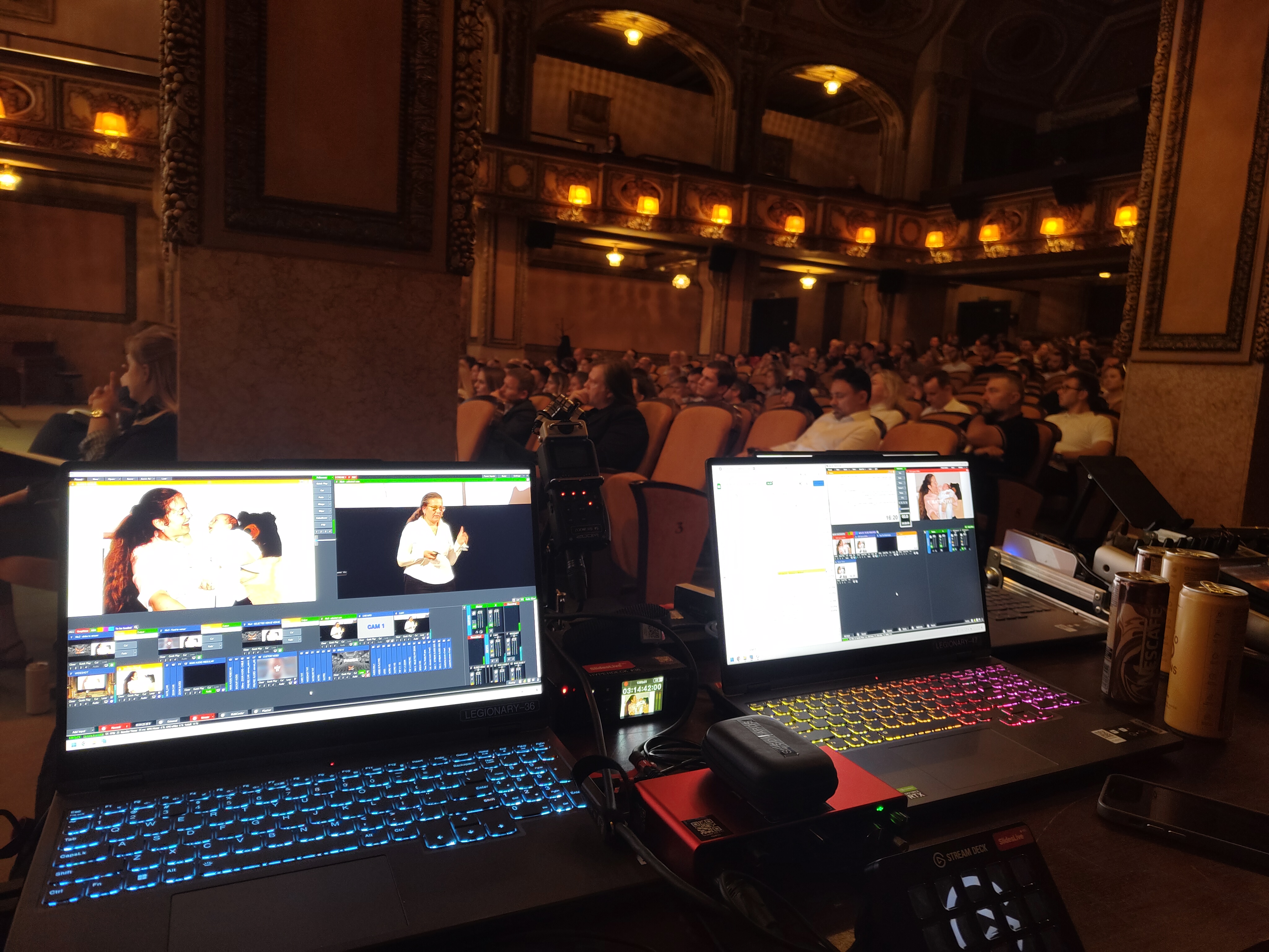 Audience reacting during a tech talk.